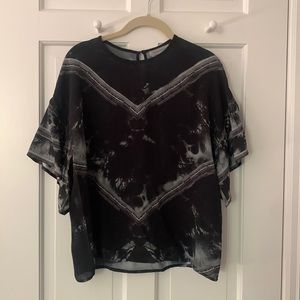 Conditions Apply loose fit crepe tie dye blouse.